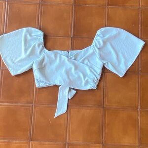 She + Sky Soft Blue Crop Top with a Bow. Size large. Great Condition!